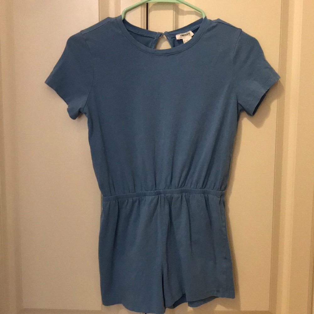 Baby blue romper lighter blue in person
